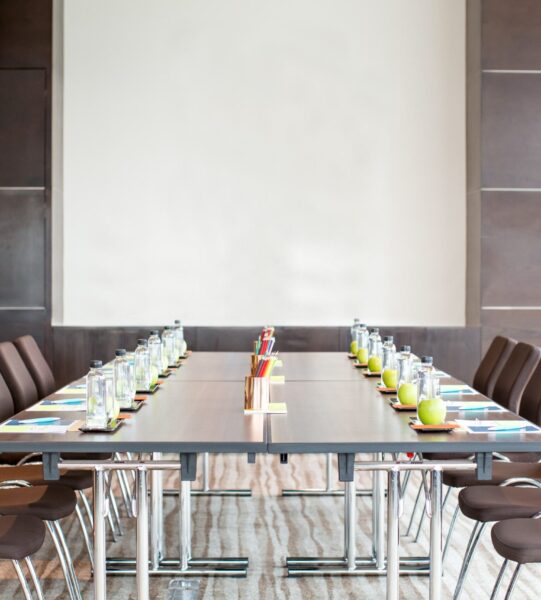 empty-meeting-room-with-table-whiteboard